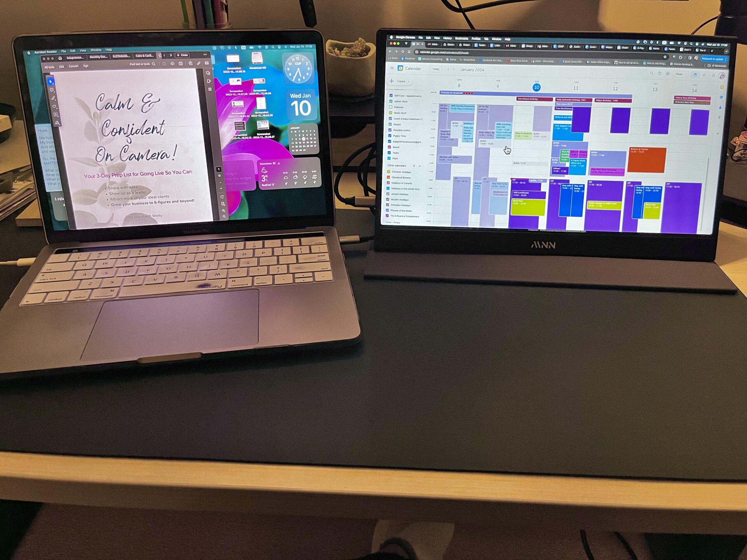 Two laptop screens side by side showing a weekly planner and a colour-coded project board for a small business